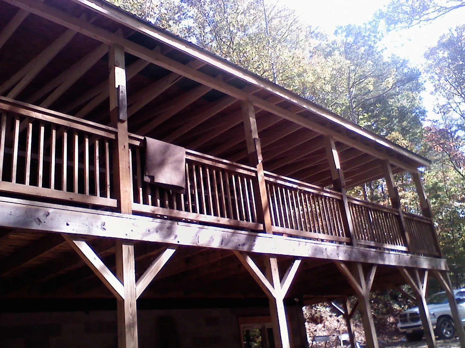 Timber framing under a new elevated porch and deck — Roof Leak Repair in Mount Summit by Roofing Brothers